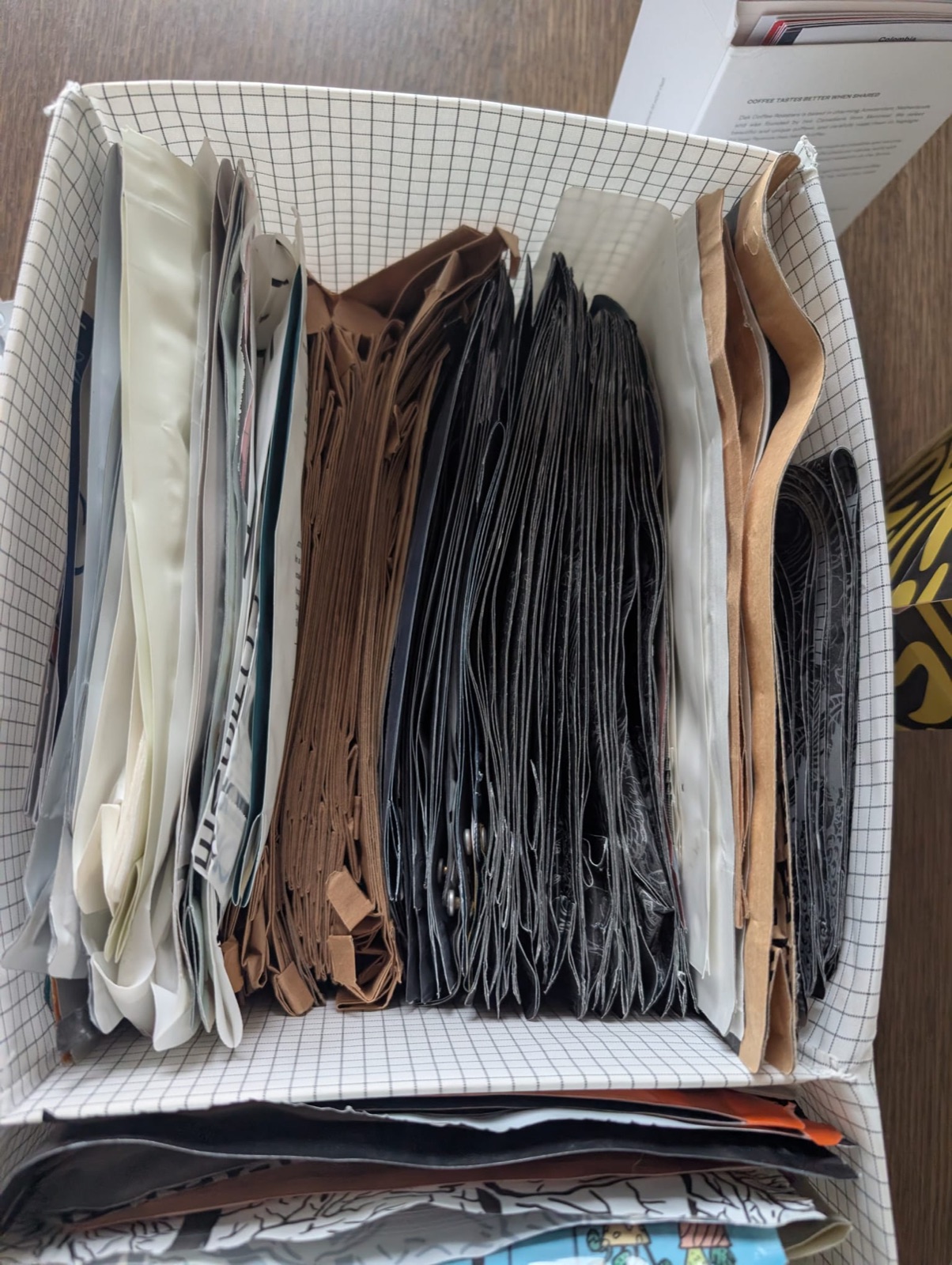 Archive box of flattened coffee bags
